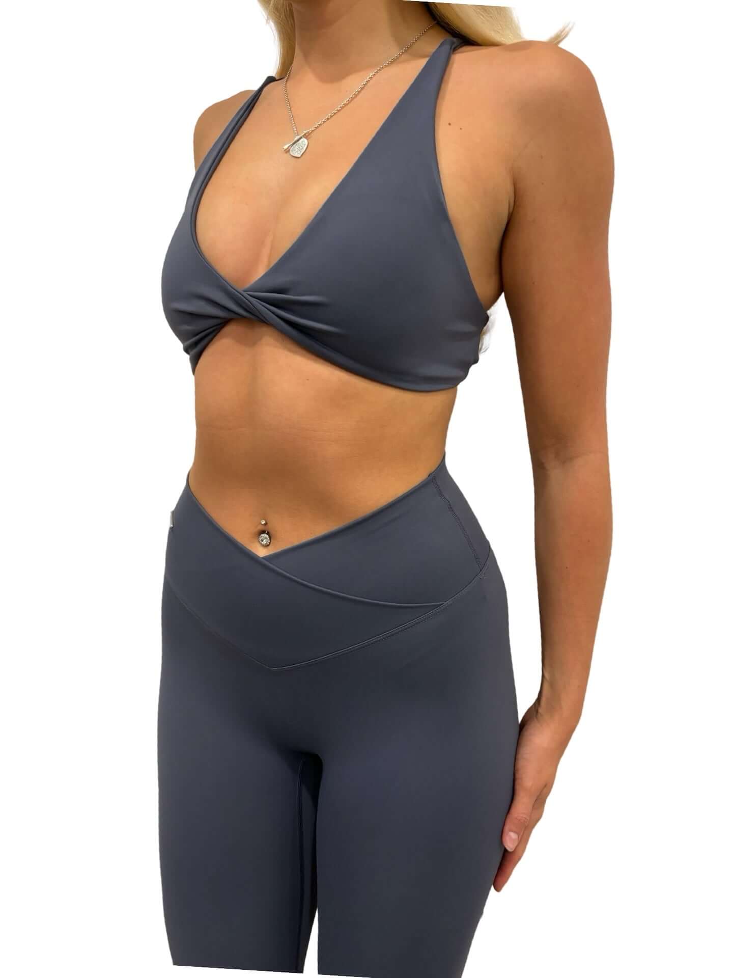 Woman wearing Pilates Reformer Collection - High Waisted Wrap Front Timeless Gym Leggings, showcasing a sleek, supportive fit ideal for workouts.