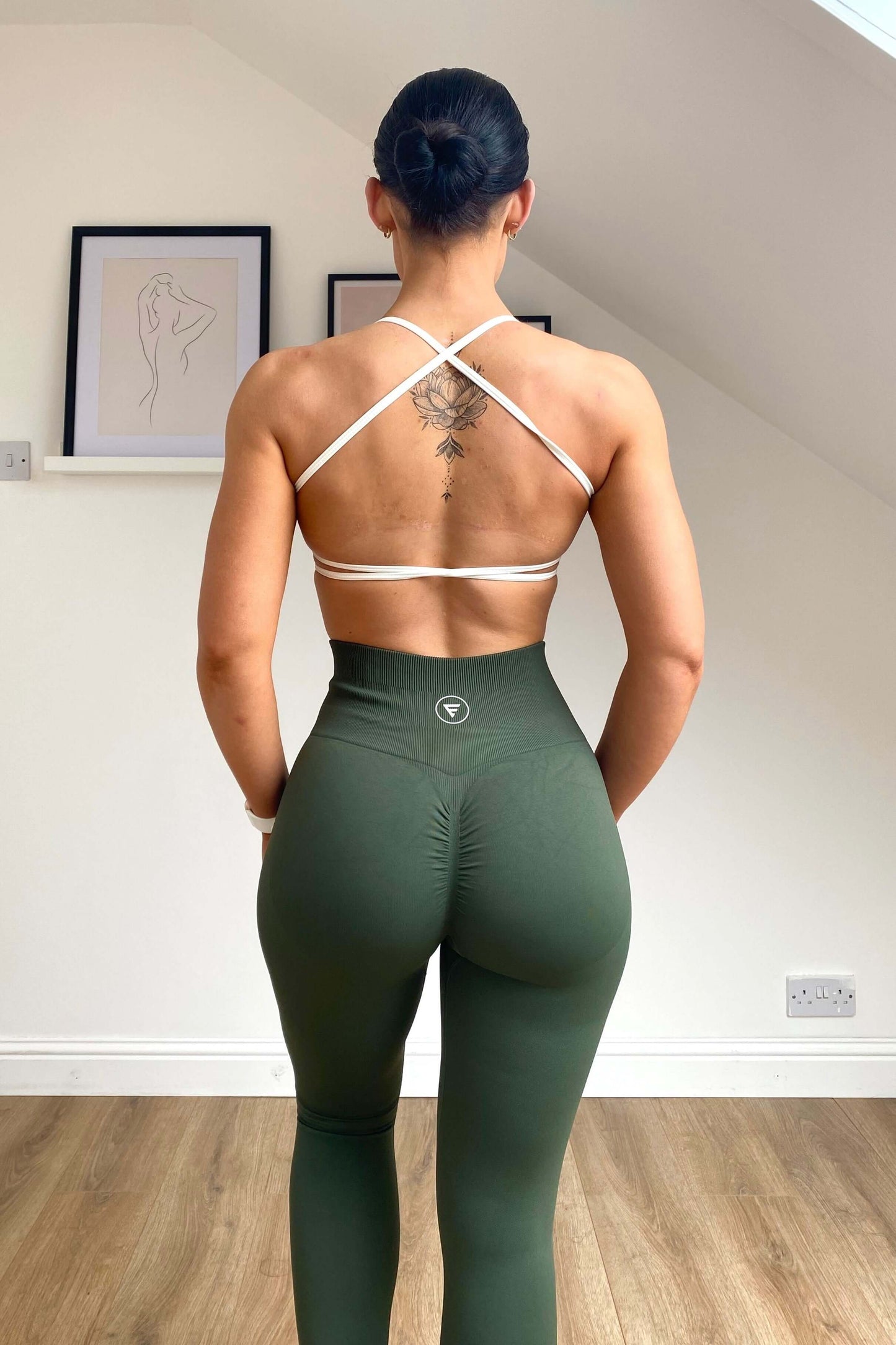 Skin2Skin Scrunch Collection - Scrunch Bum Leggings on a model's back, showcasing the ruched design that enhances and lifts the silhouette.