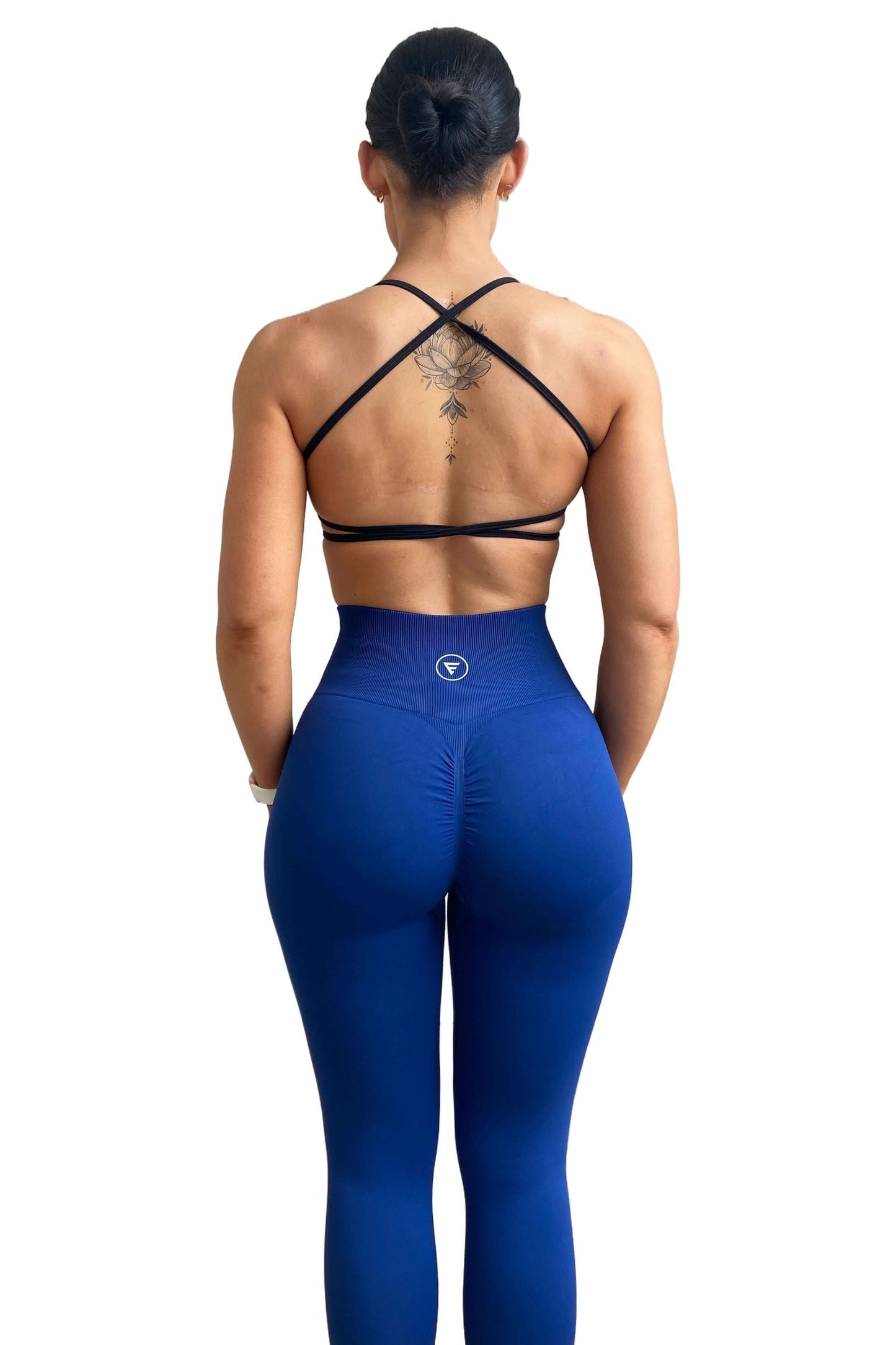 Skin2Skin Scrunch Collection - Scrunch Bum Leggings highlighting a ruched design on a woman's waist, enhancing her silhouette.
