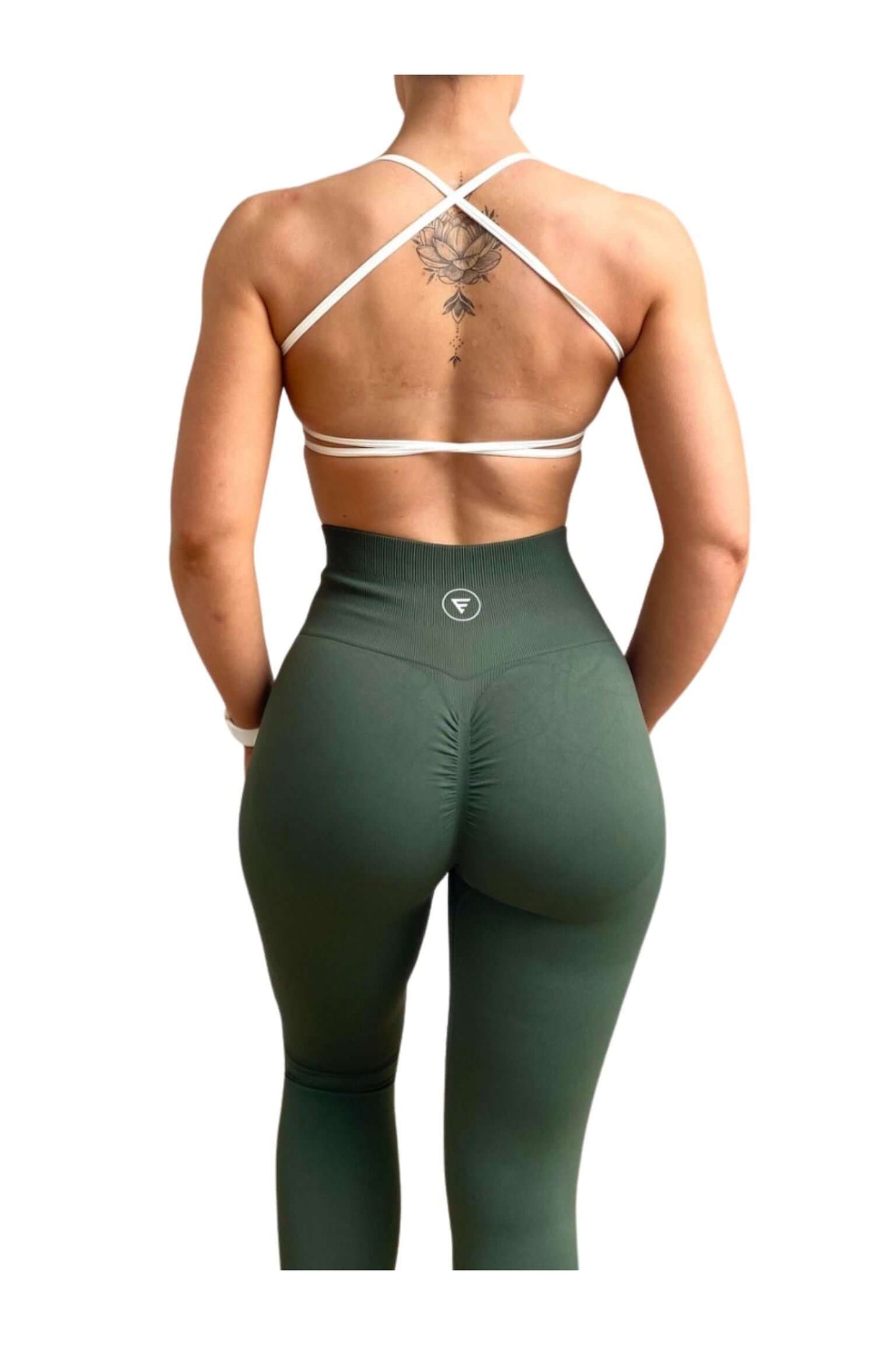 Skin2Skin Scrunch Collection - Scrunch Bum Leggings showcased on a woman with a back tattoo, highlighting the ruched design for a flattering fit.
