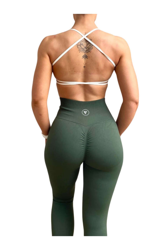 Skin2Skin Scrunch Collection - Scrunch Bum Leggings showcased on a woman with a back tattoo, highlighting the ruched design for a flattering fit.