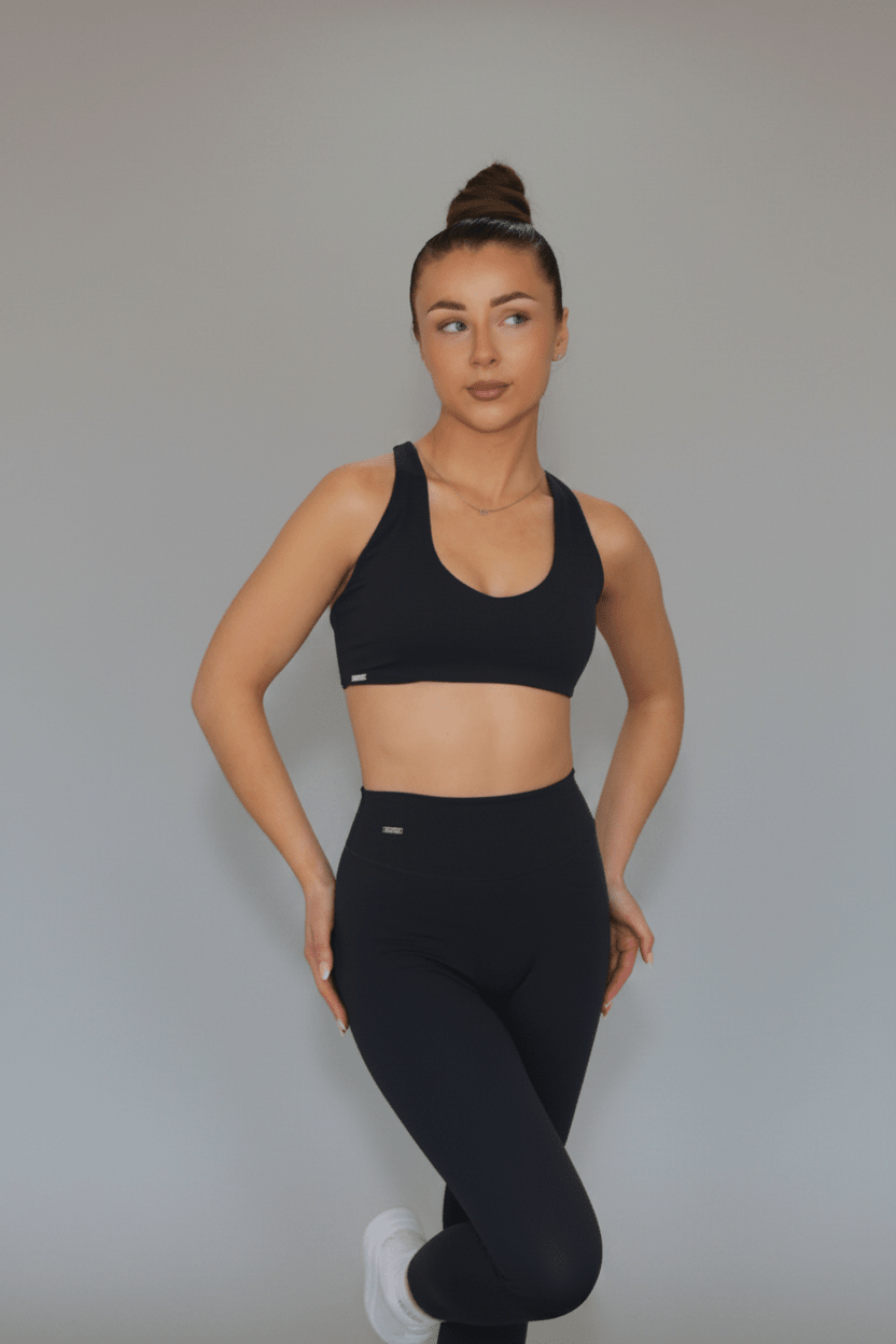 The Elena Soft Core Collection - The Everyday Staple Gym Leggings modeled by a woman in a sporty pose, highlighting their sleek design and comfortable fit.